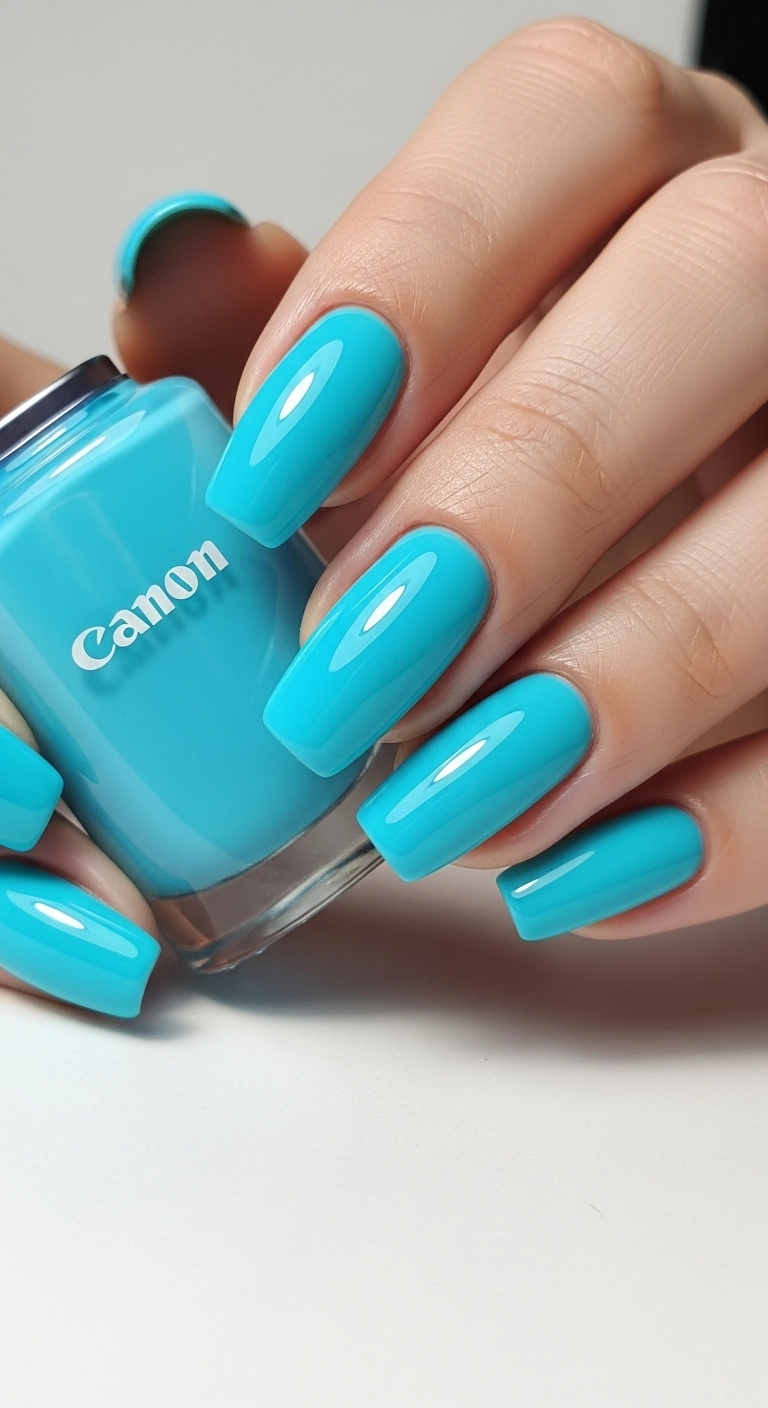 A hand with squoval nails showing a high-gloss, bright 